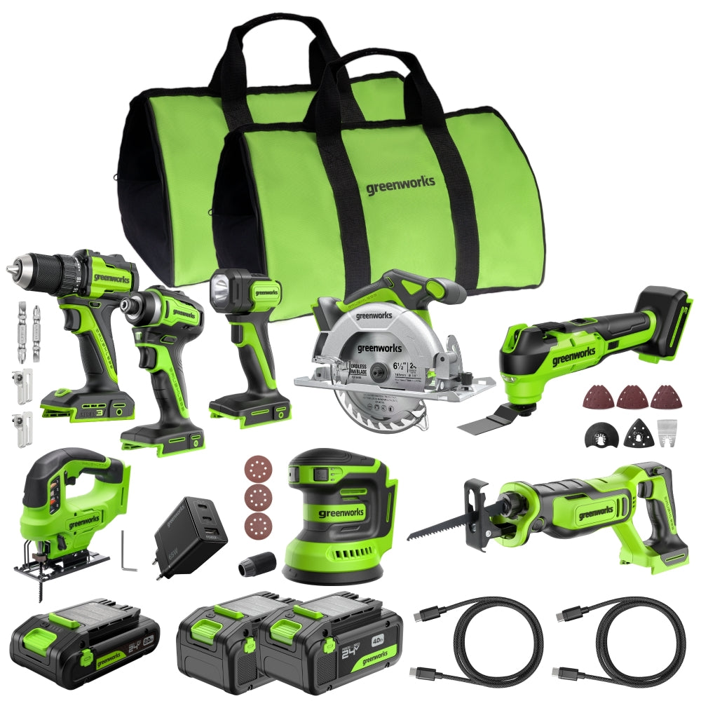 Greenworks power tool set with various tools and accessories on a white background